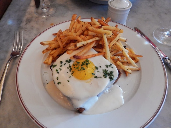 Croque Madame with a side of Truffle Fries at Bouchon Bistro